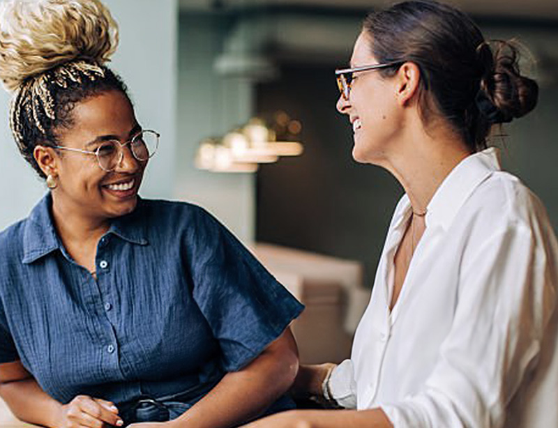 Two people in a supportive conversation